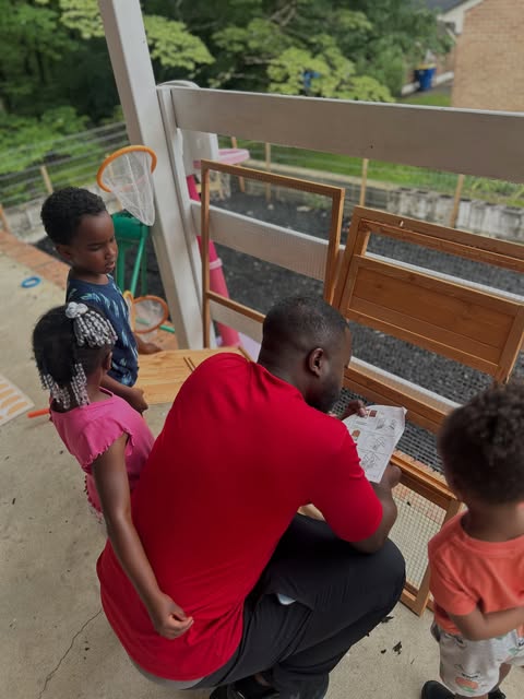 Teacher working with students outside